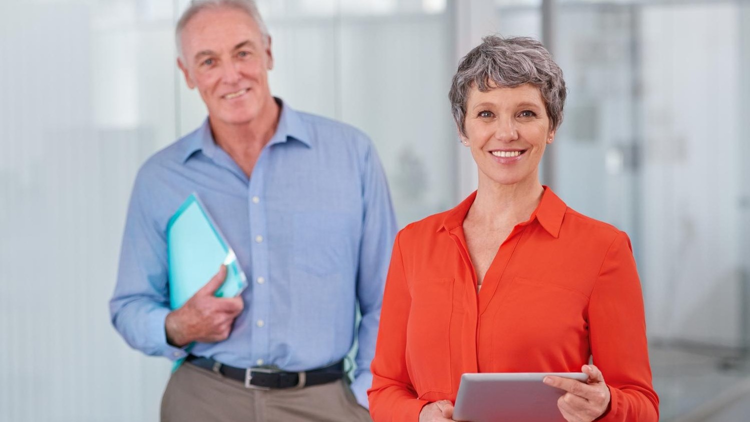 Theyre bringing expert experience to their business Two mature coworkers standing together in the office