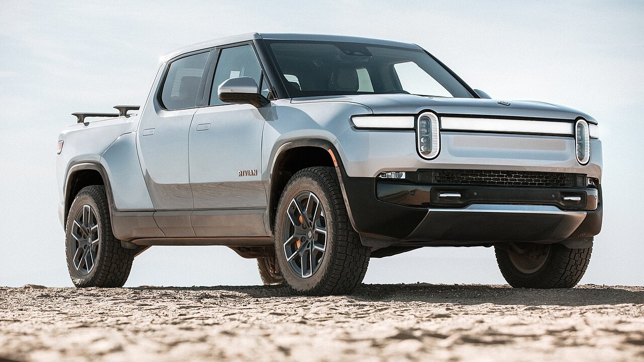 The Rivian R1T, shown here, is the first modern electric pickup to market.