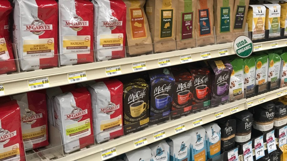 Bags of coffee at a grocery store