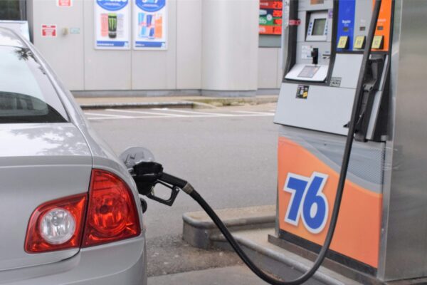 a car is parked at a gas pump