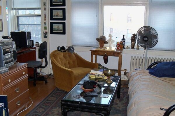 The main room of a studio apartment in Minneapolis, Minnesota, USA. A small alcove is partially visible to the left near the computer; not shown are the small bathroom, kitchen, and entry way.