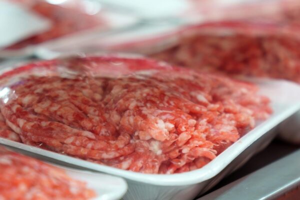 Raw fresh beef meat on the shelves of a hypermarket Buying raw meat