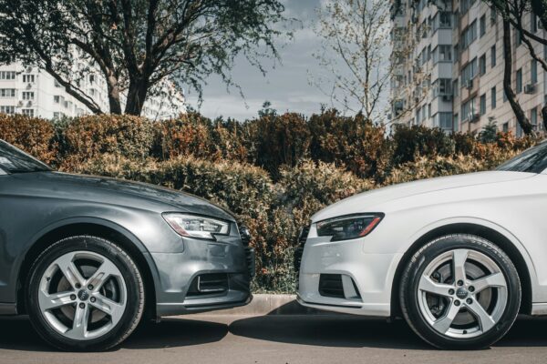 a couple of cars parked next to each other