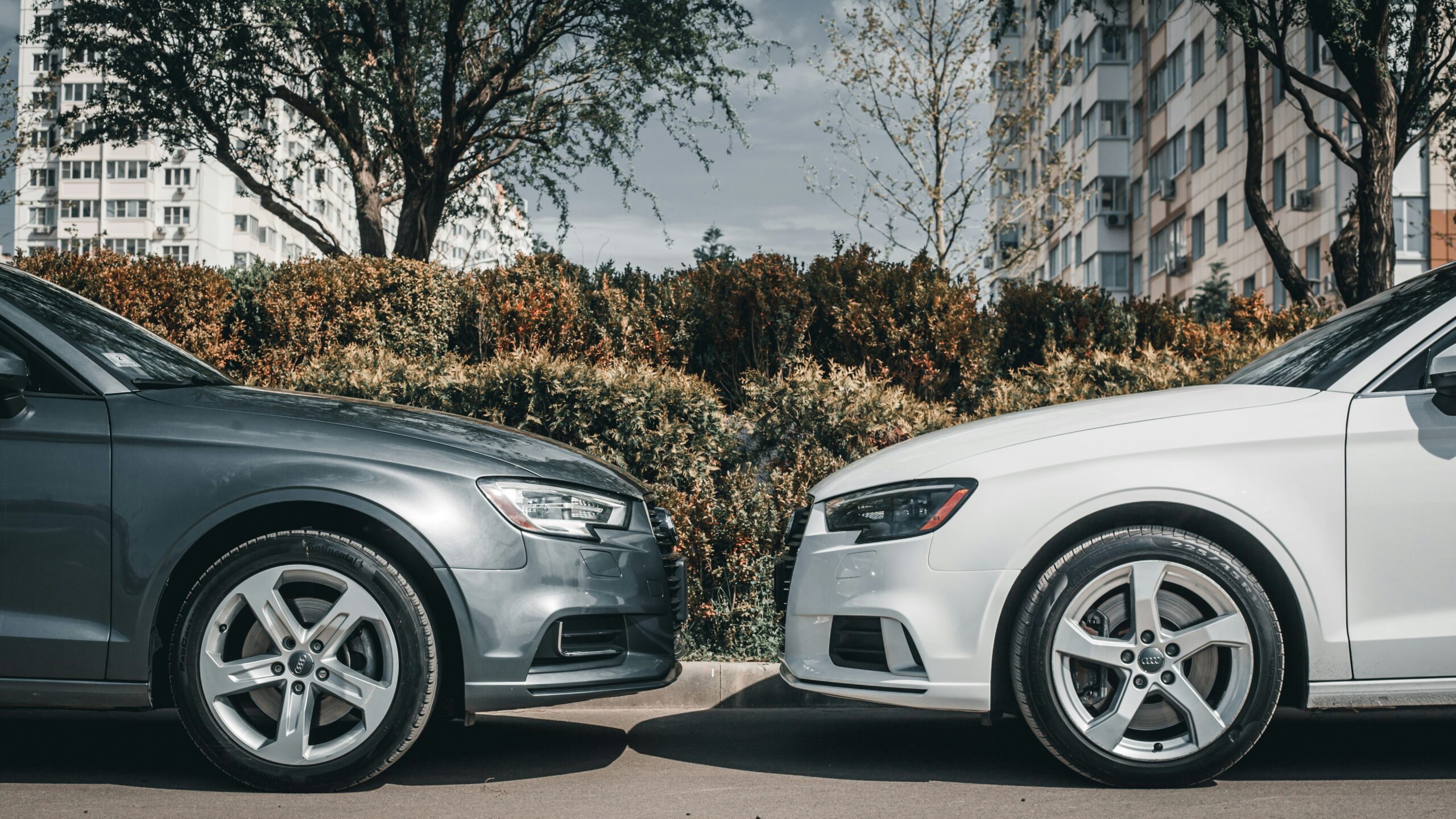 a couple of cars parked next to each other