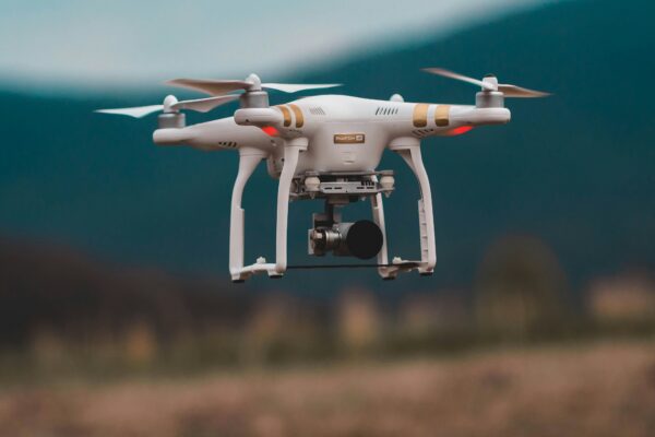 selective focus photography of DJI Phantom 3 Professional quadcopter drone