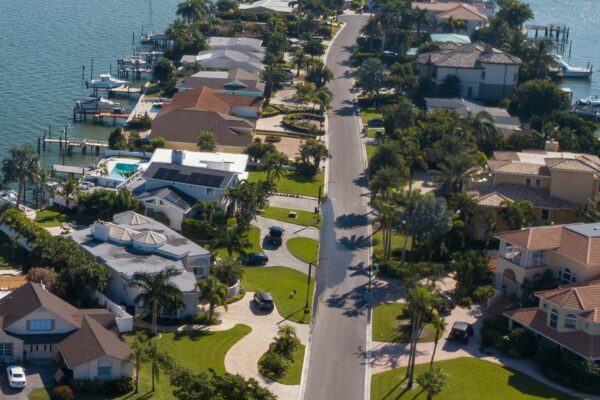 a large body of water surrounded by houses