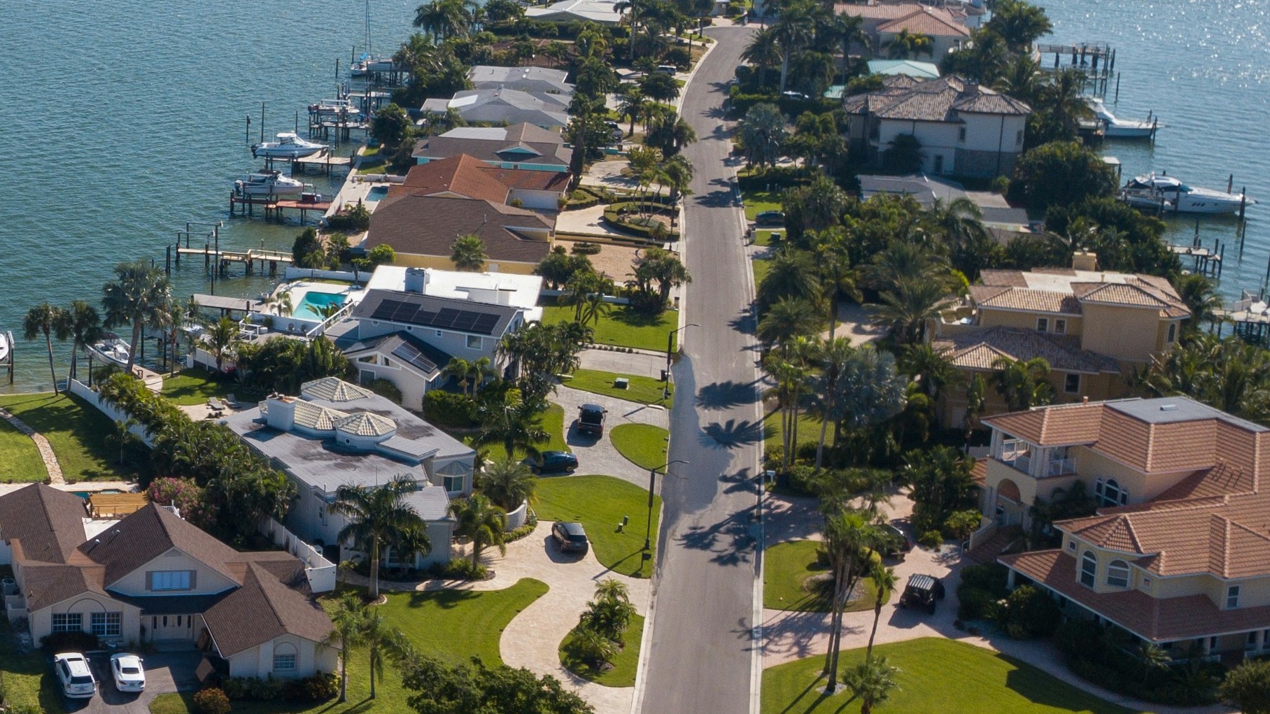 a large body of water surrounded by houses