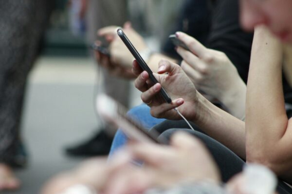 person holding black phone