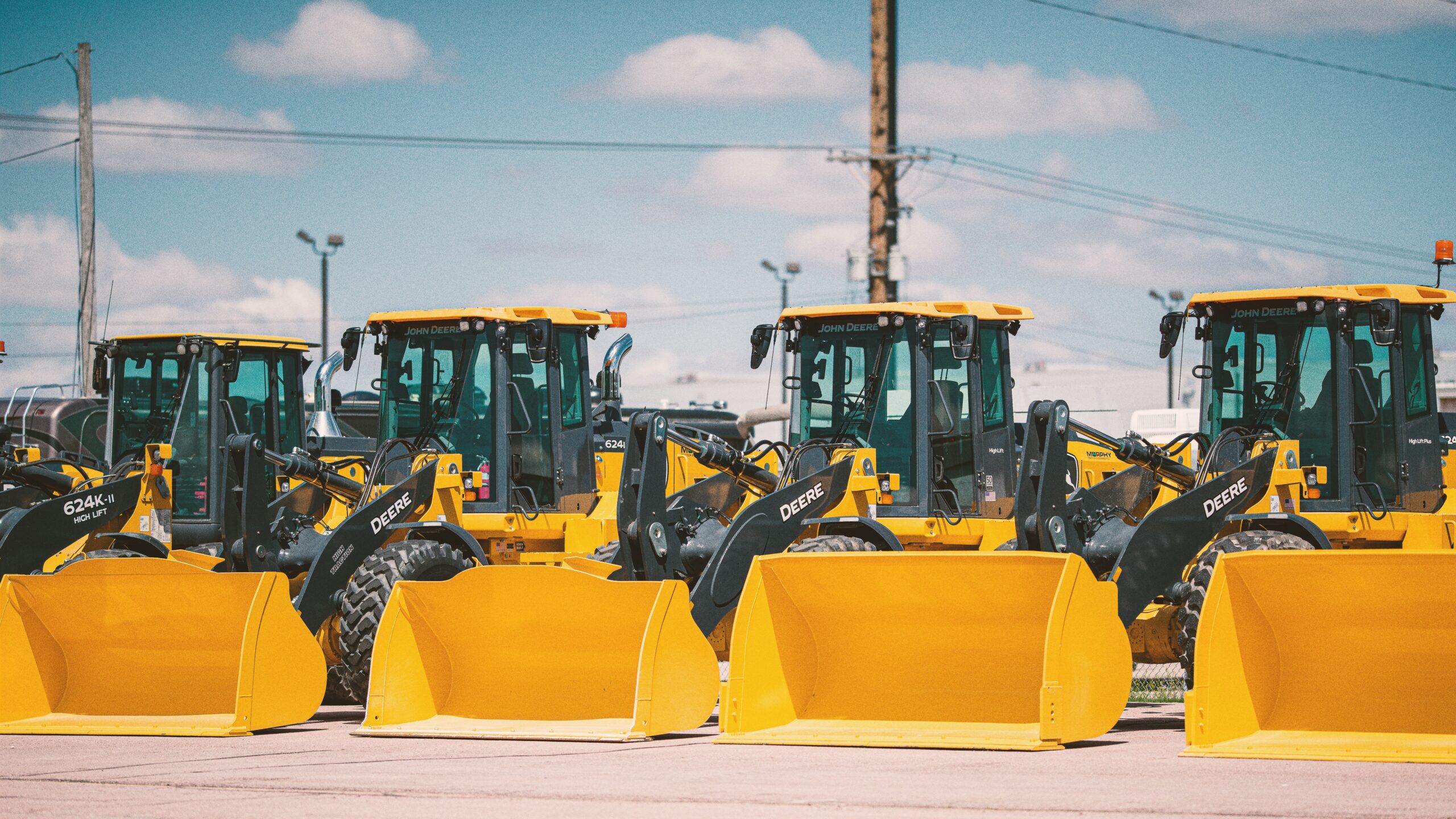yellow and black heavy equipment on snow covered ground during daytime