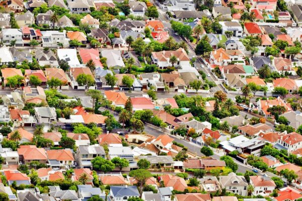 High angle view of houses and buildings in town