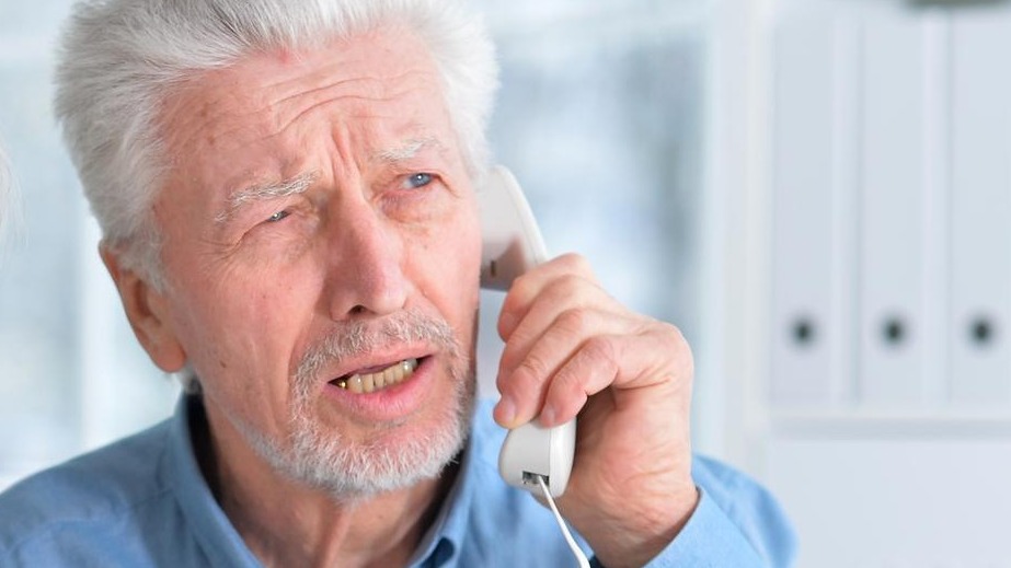 An elderly couple is sick and takes medication at home
