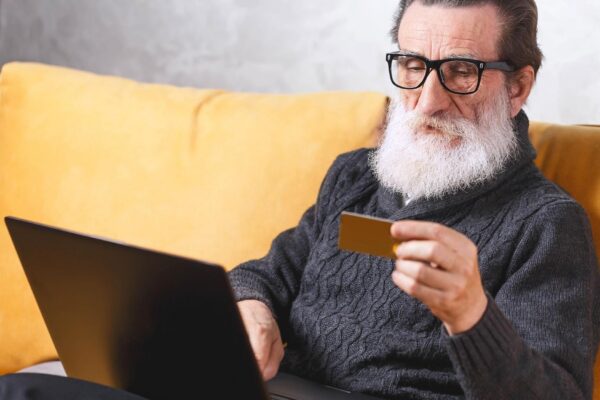 Cheerful senior bearded man in glasses
