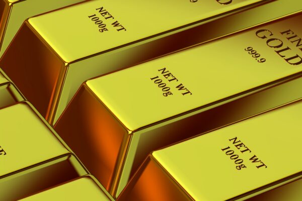 Shiny gold bars stacked neatly, symbolizing wealth, investment, and financial security.