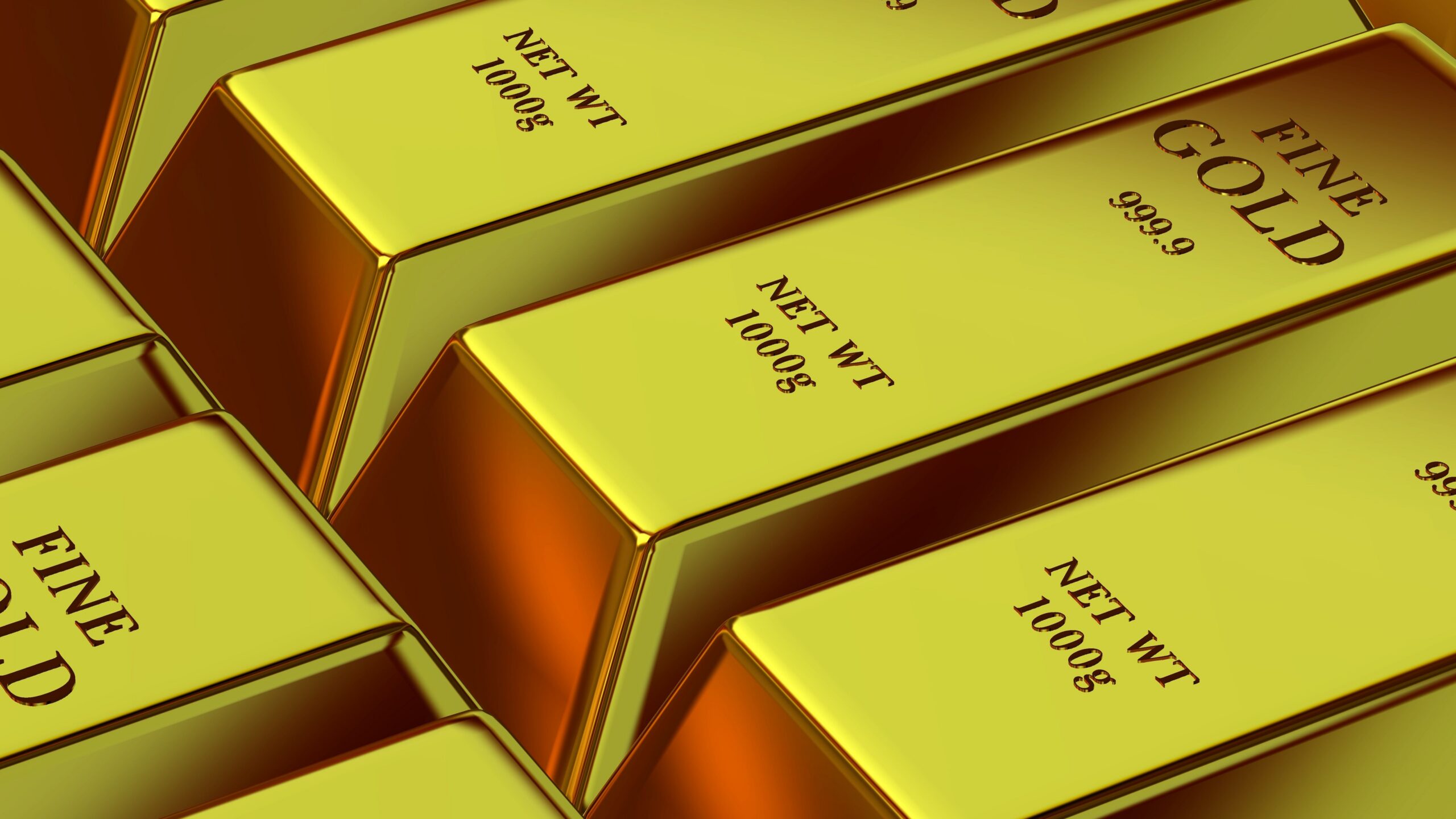 Shiny gold bars stacked neatly, symbolizing wealth, investment, and financial security.