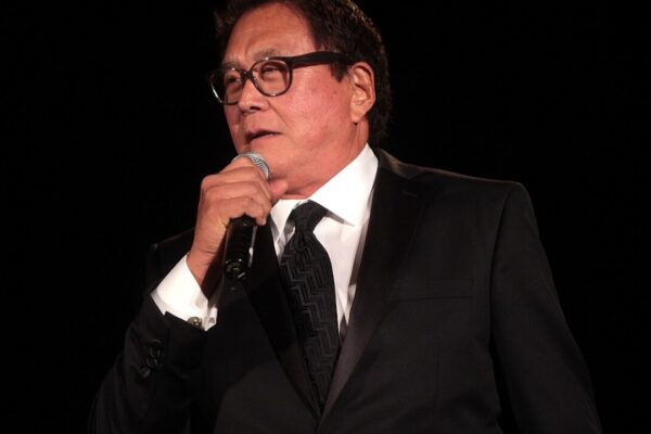Robert Kiyosaki speaking at a gala event for Ben Carson hosted by Wake Up America at the Westin Kierland Resort & Spa in Scottsdale, Arizona. Please attribute to Gage Skidmore if used elsewhere.