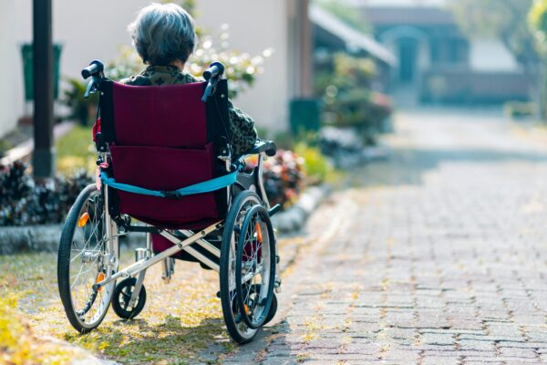 woman sitting on wheelchair