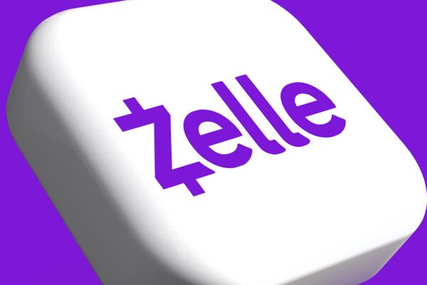 a white dice with the word zelle on it