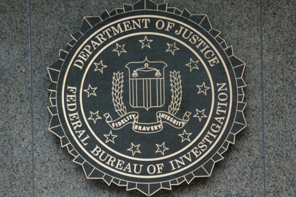the seal of the department of justice on a wall