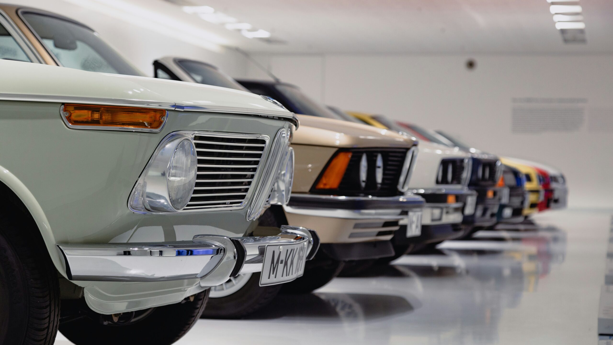selective focus photography of assorted-color vehicles