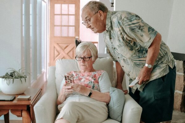 a woman and a man in a living room
