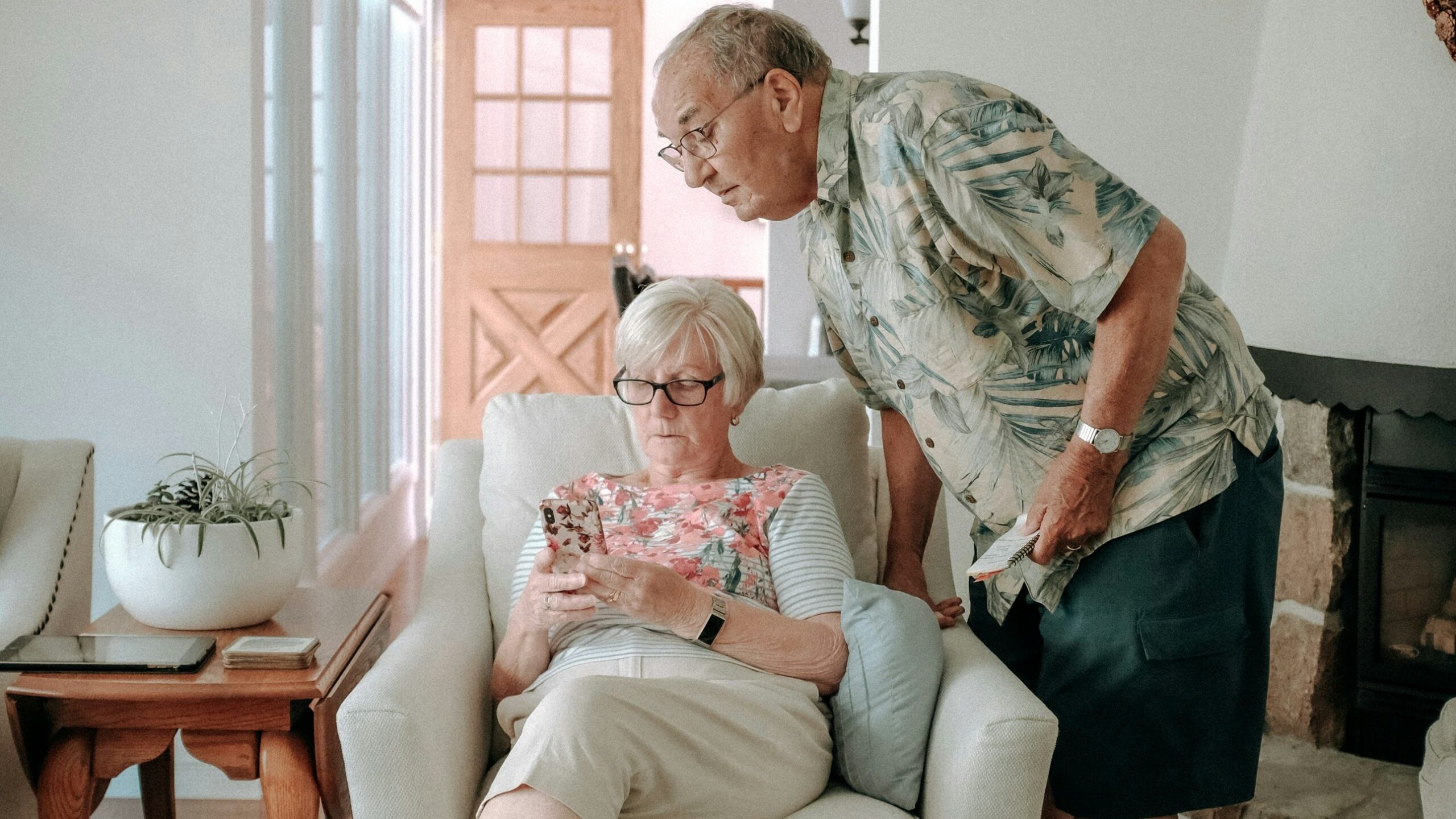 a woman and a man in a living room