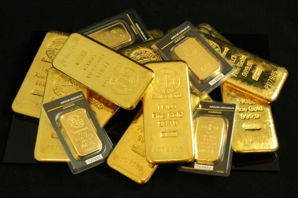 a pile of gold bars sitting on top of a table