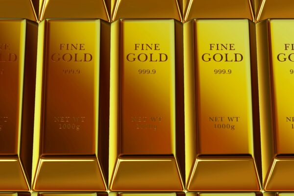 Rows of shiny gold bars stacked neatly