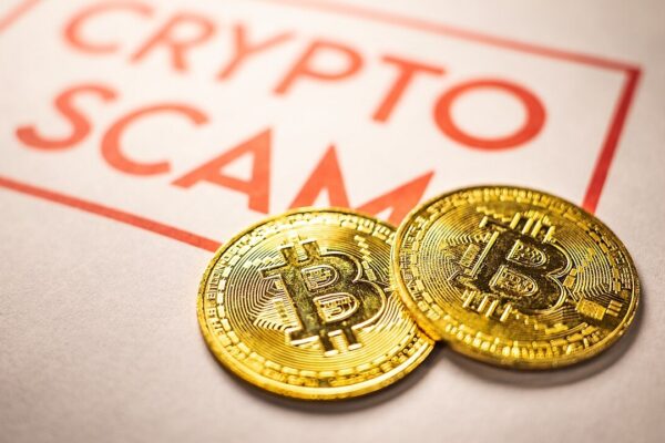 Photo of a couple of Bitcoin crypto medallions alongside the words 'Crypto Scam'. You can use the image under the Attribution Creative Commons licence, though we do ask that you please credit https://www.bybit.com/en-US/ with a link.