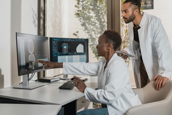 a man showing something on the computer
