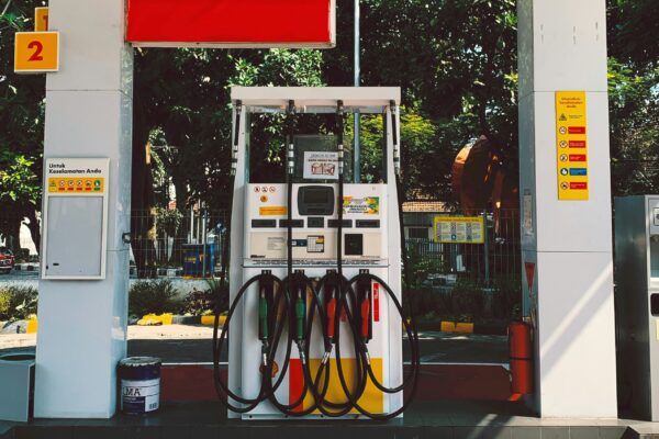 a gas station with a red carpet on the floor