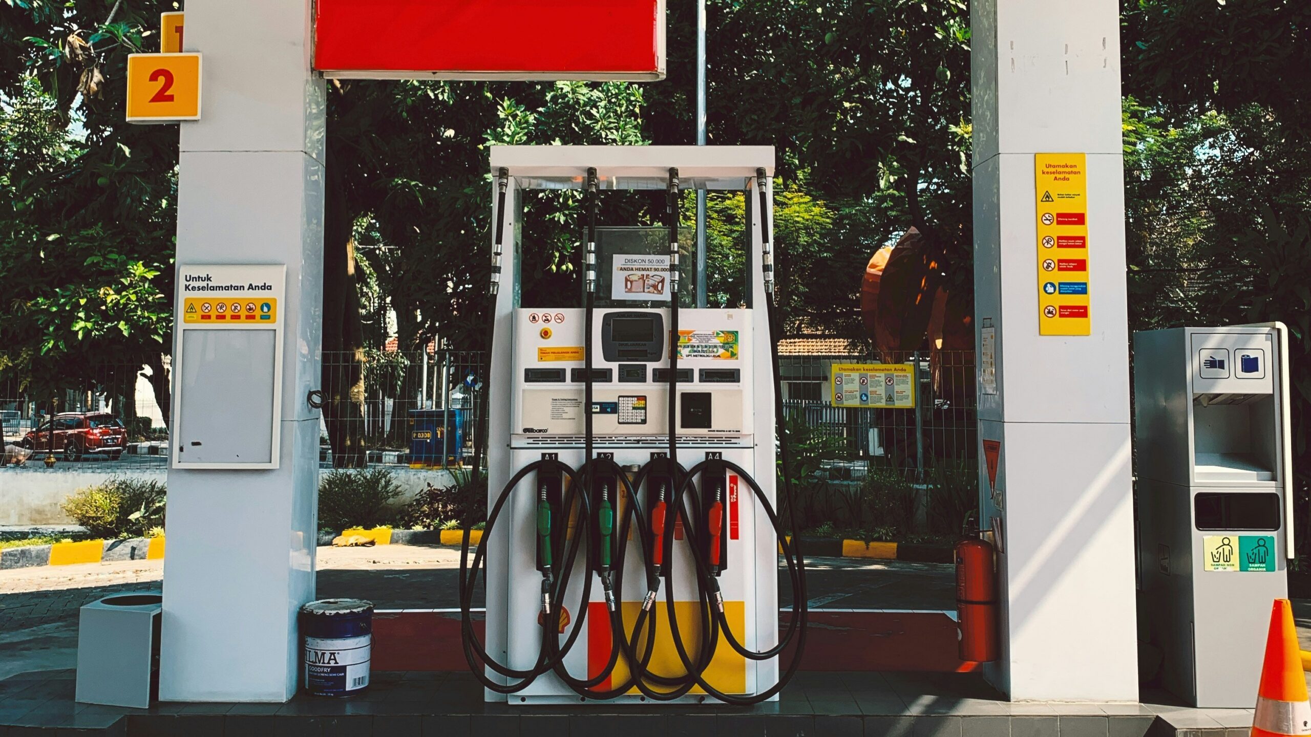 a gas station with a red carpet on the floor