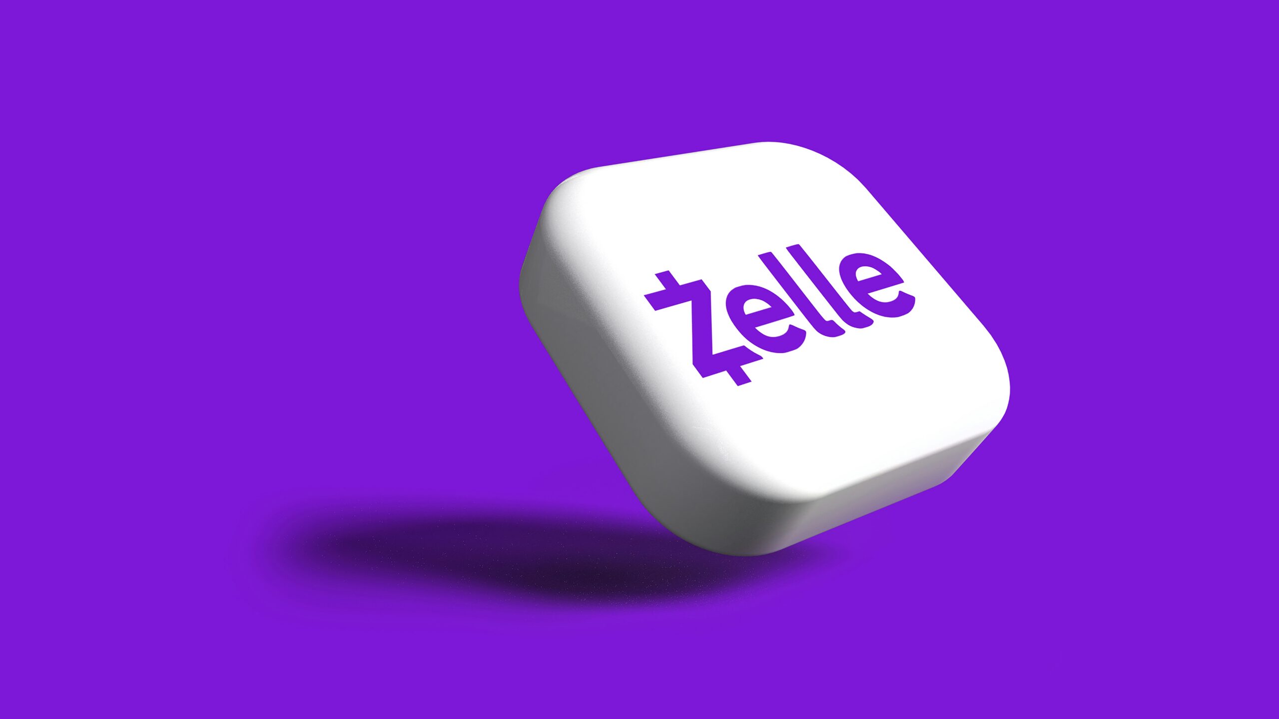 a white dice with the word zelle on it