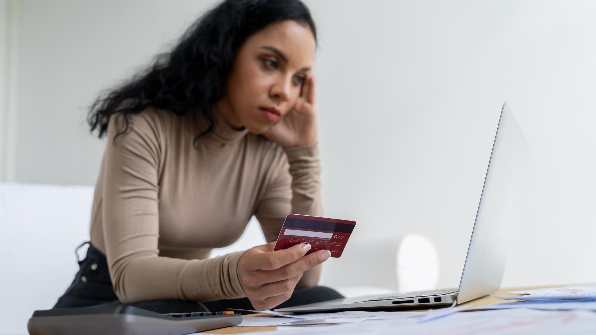 Stressed young woman has financial problems with credit card debt to pay crucial show concept of bad personal money and mortgage pay management crisis sad and unhappy