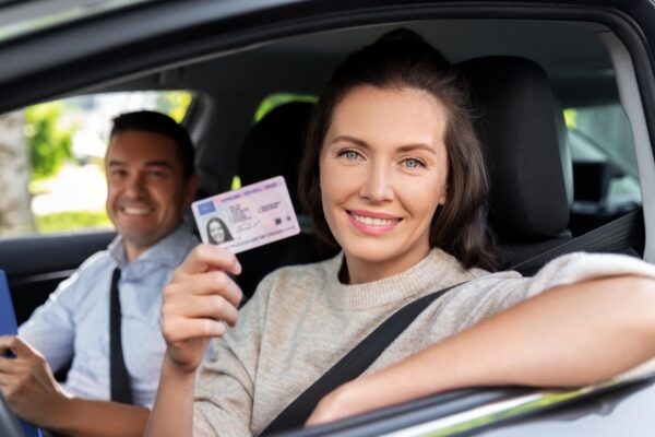 car driving instructor and driver with license