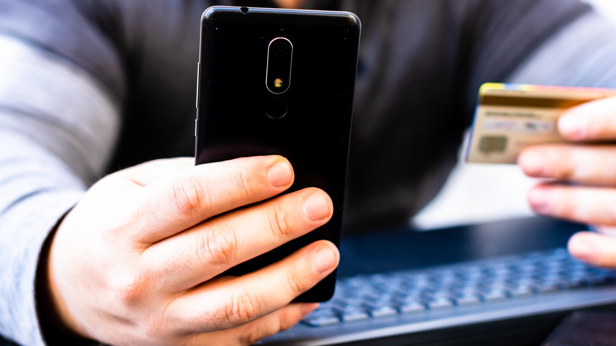 Close-up of person using mobile phone