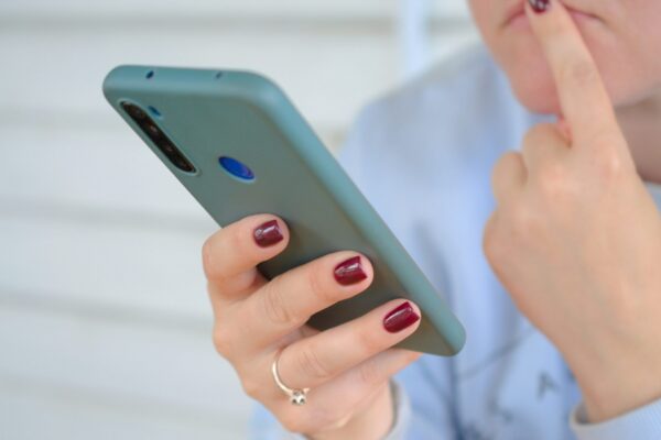a person holding a cell phone