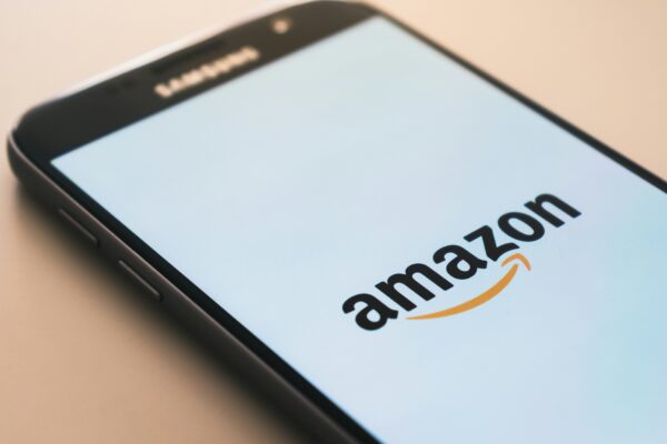 black Samsung Galaxy smartphone displaying Amazon logo