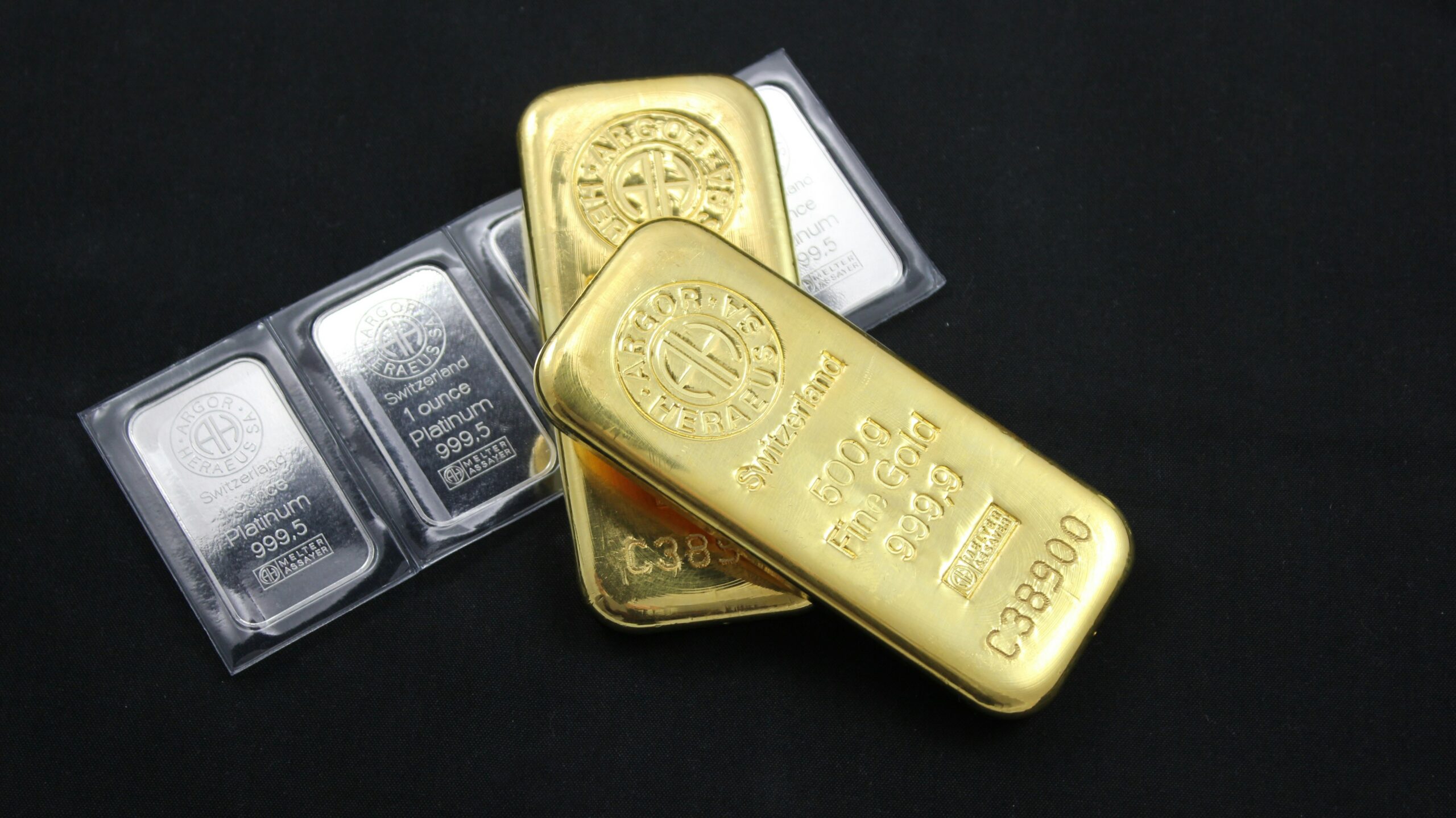 gold and silver oval case