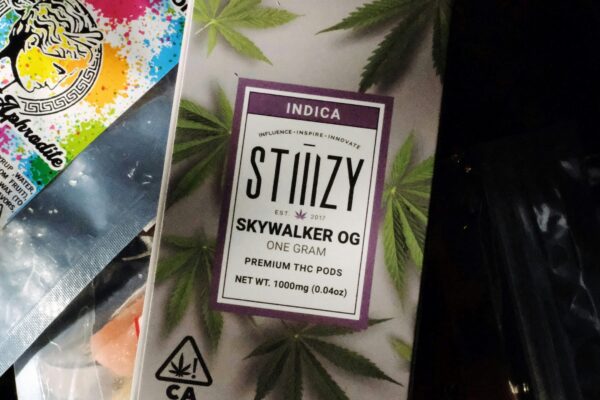 a package of marijuana sitting on top of a plastic bag