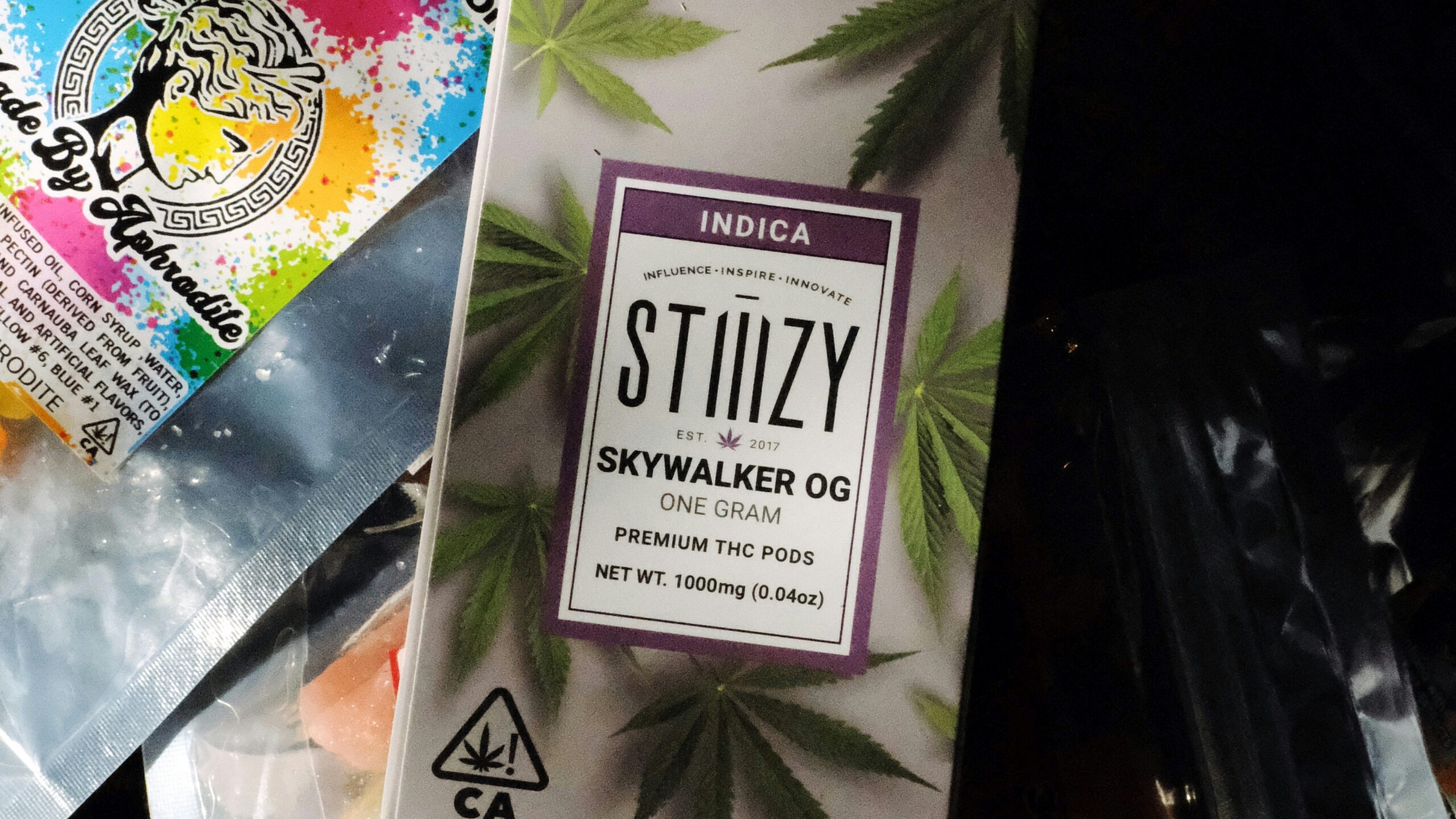 a package of marijuana sitting on top of a plastic bag