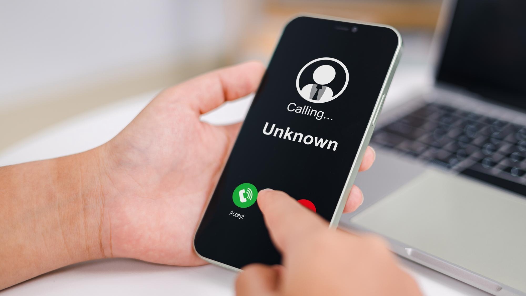 Woman receives a phone call from an unknown number Concept of scammers or strangers fraud and contact to sell mobile internet promotions spam fake identity scammer scam with mobile phone