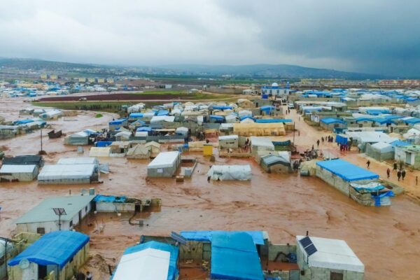 A large group of tents in the middle of a field