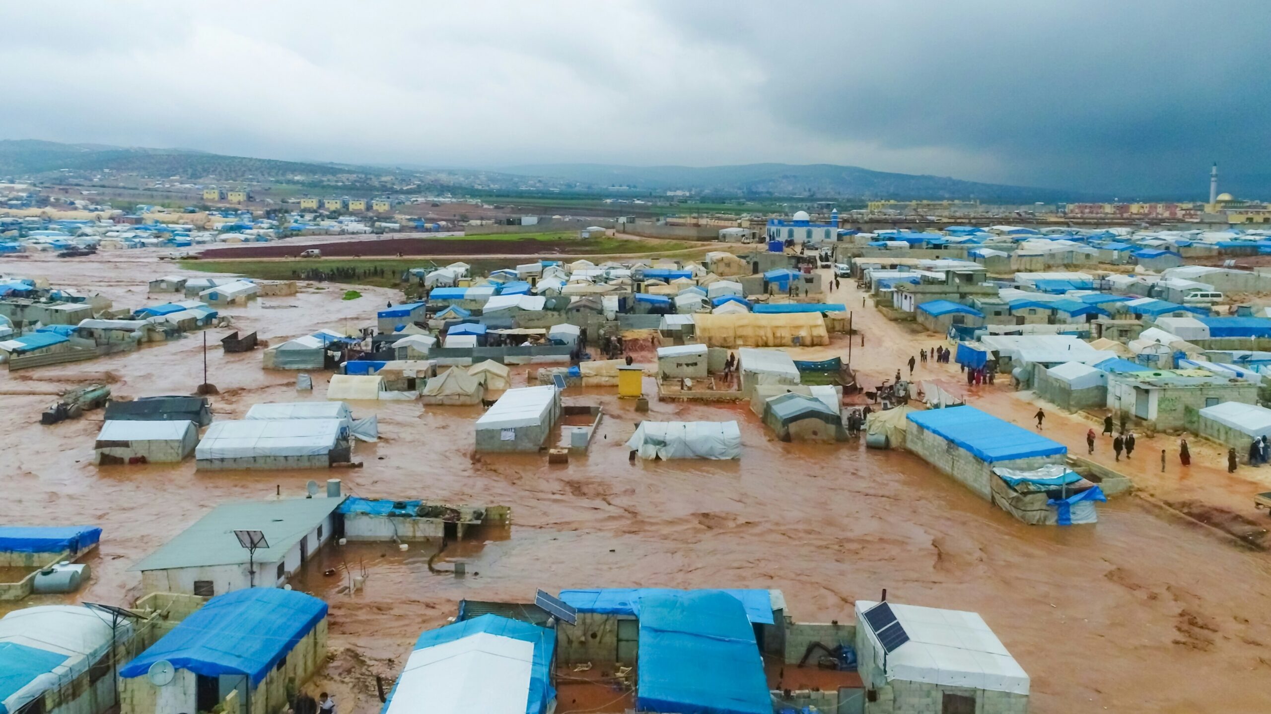 A large group of tents in the middle of a field