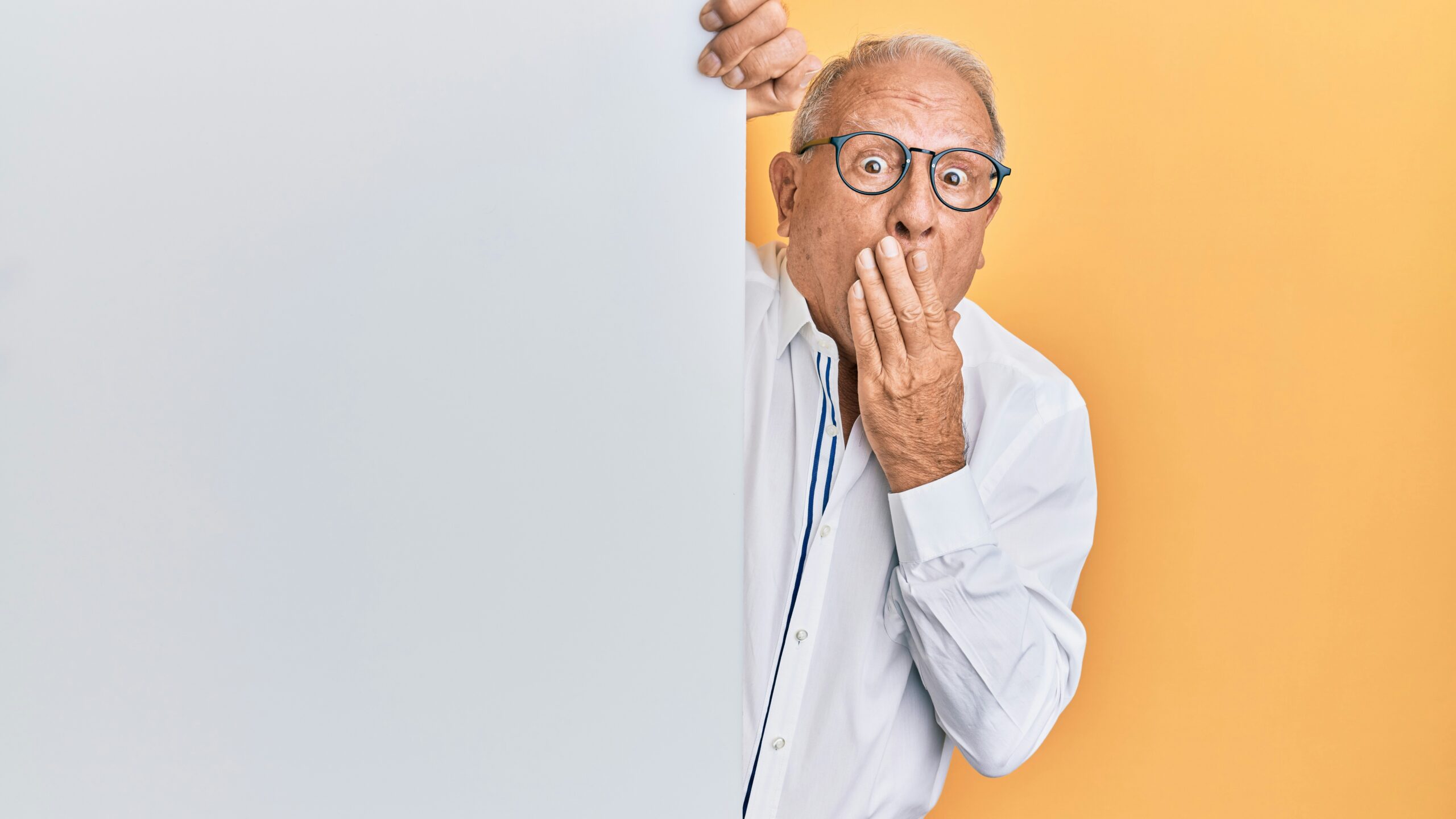 man in white dress shirt wearing black framed eyeglasses