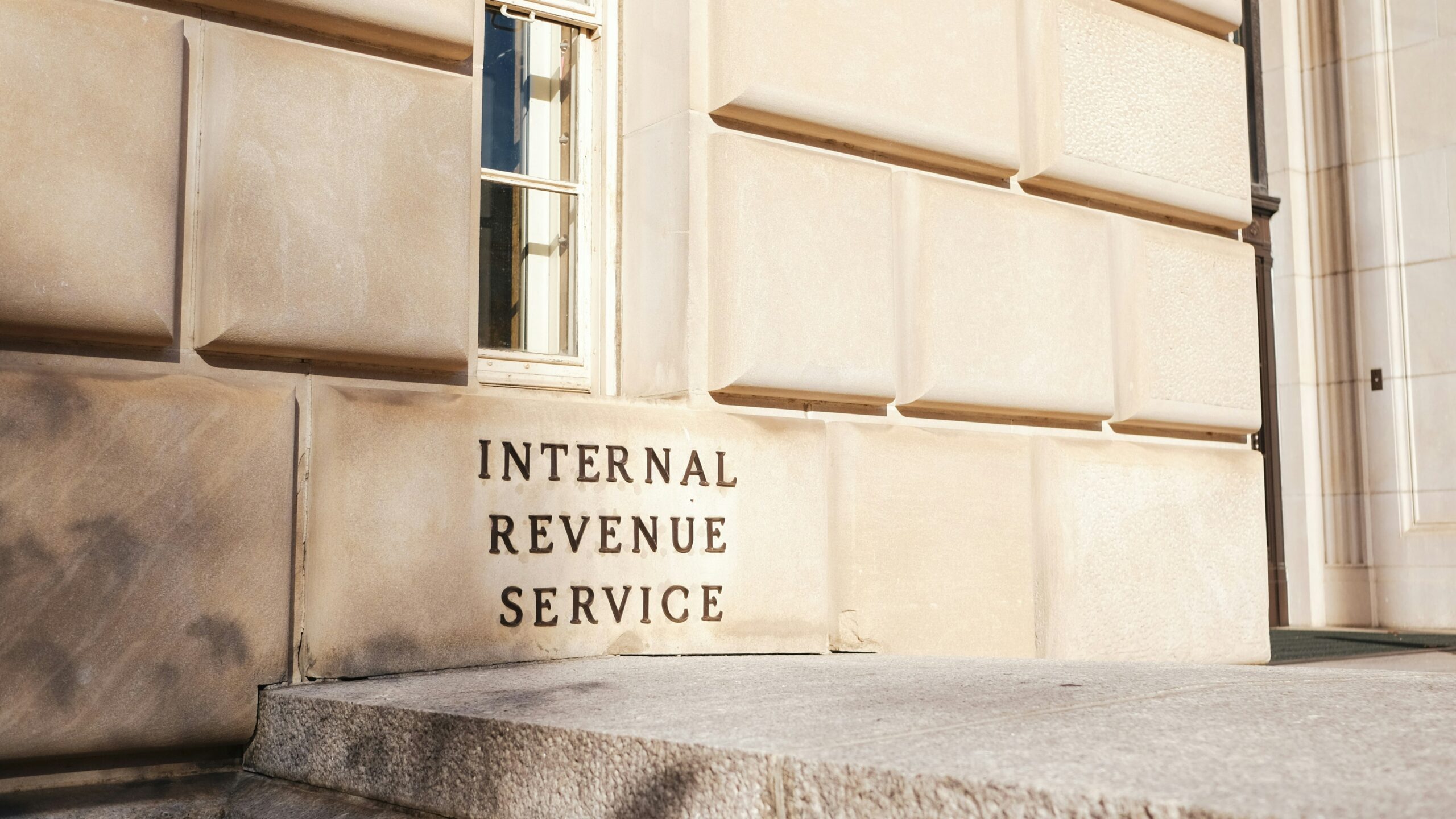 A close up of a building with a sign on it