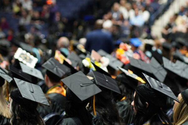 A large group of people in graduation caps and gowns