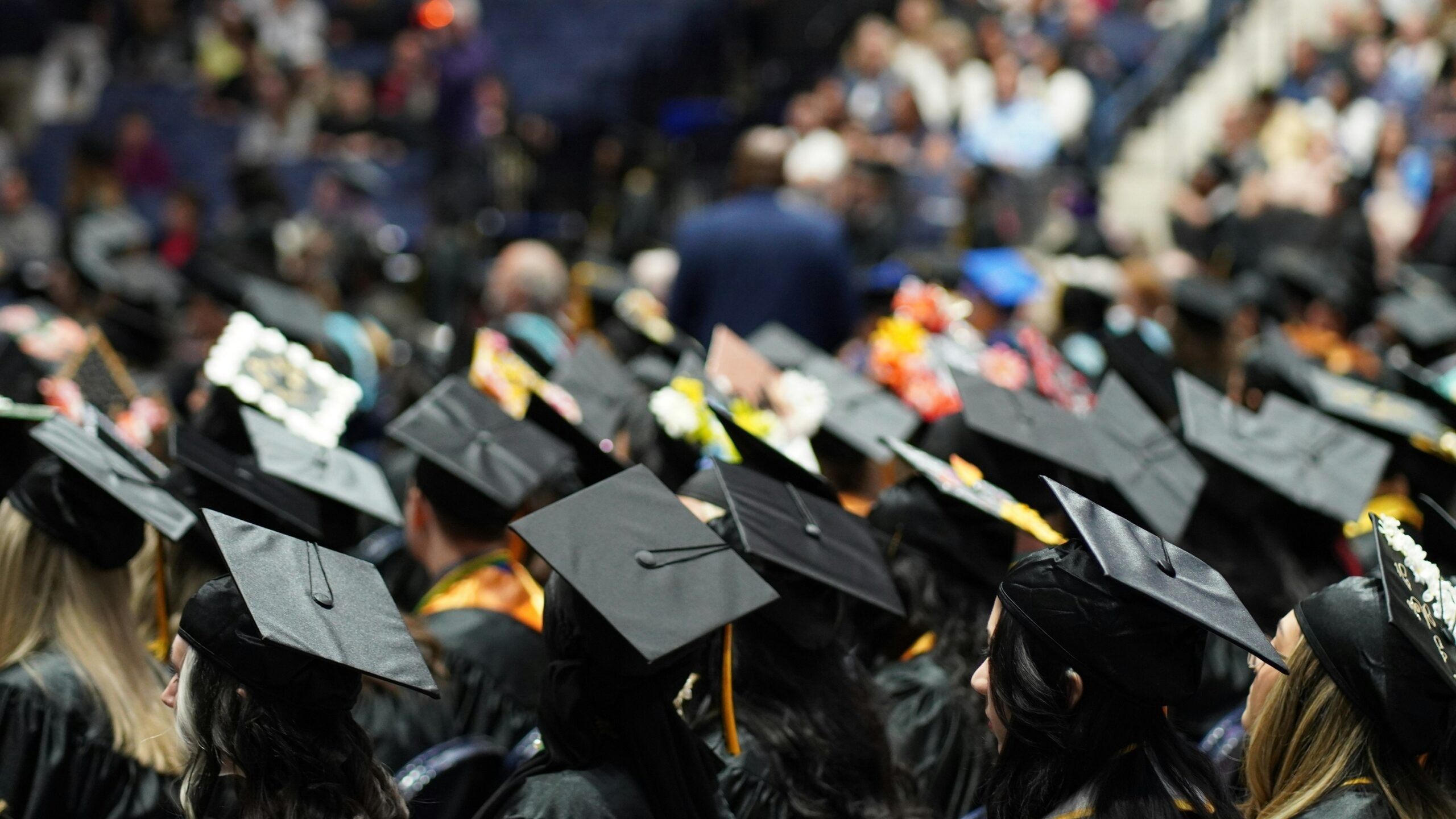 A large group of people in graduation caps and gowns