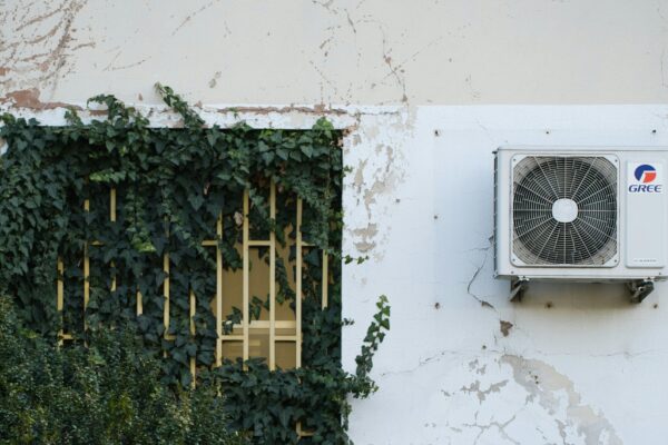 a air conditioner mounted to the side of a building