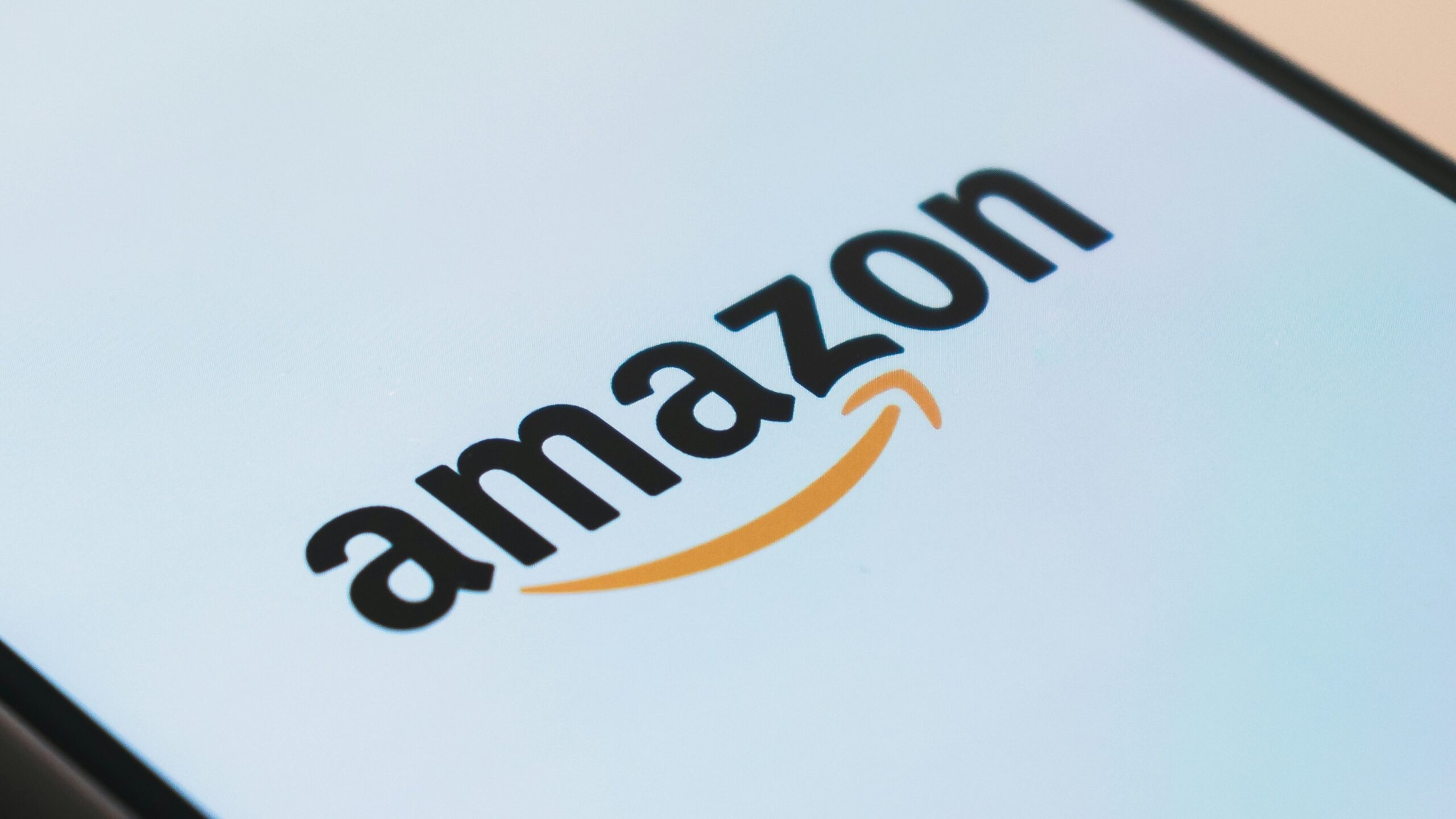 black Samsung Galaxy smartphone displaying Amazon logo