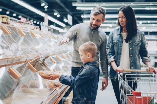 Family is shopping at a grocery store